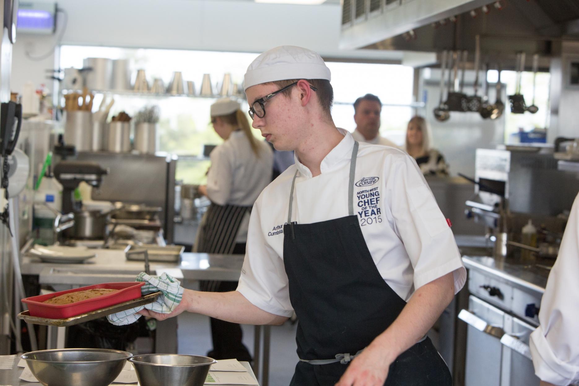 Arthur Quin (winner) in action Cumbrian chef named North West Young Chef of the Year