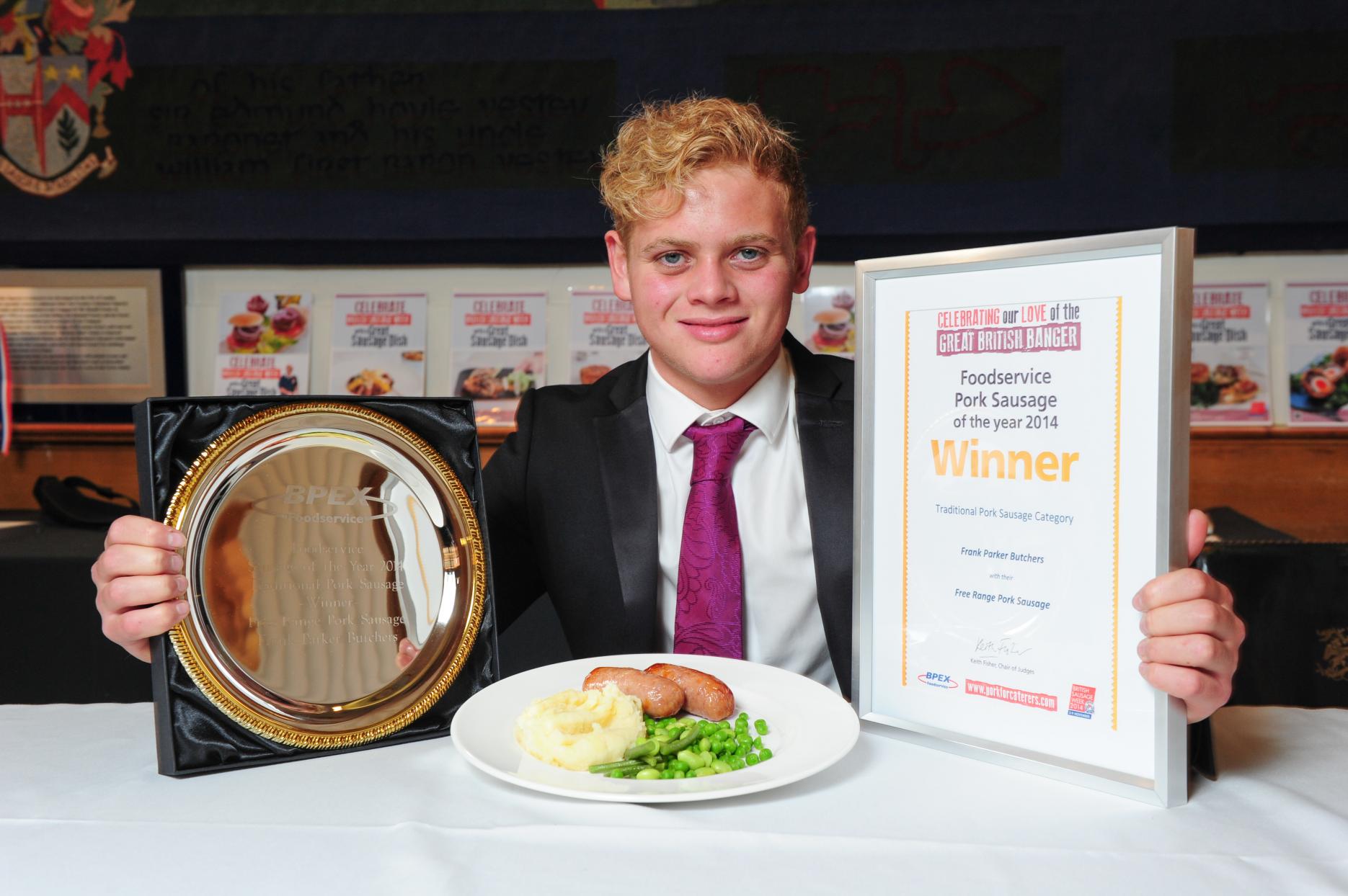 George Parker, of Frank Parker Butchers, with the winning pork sausage Frank Parker Butchers Sausage Year competition winners announced