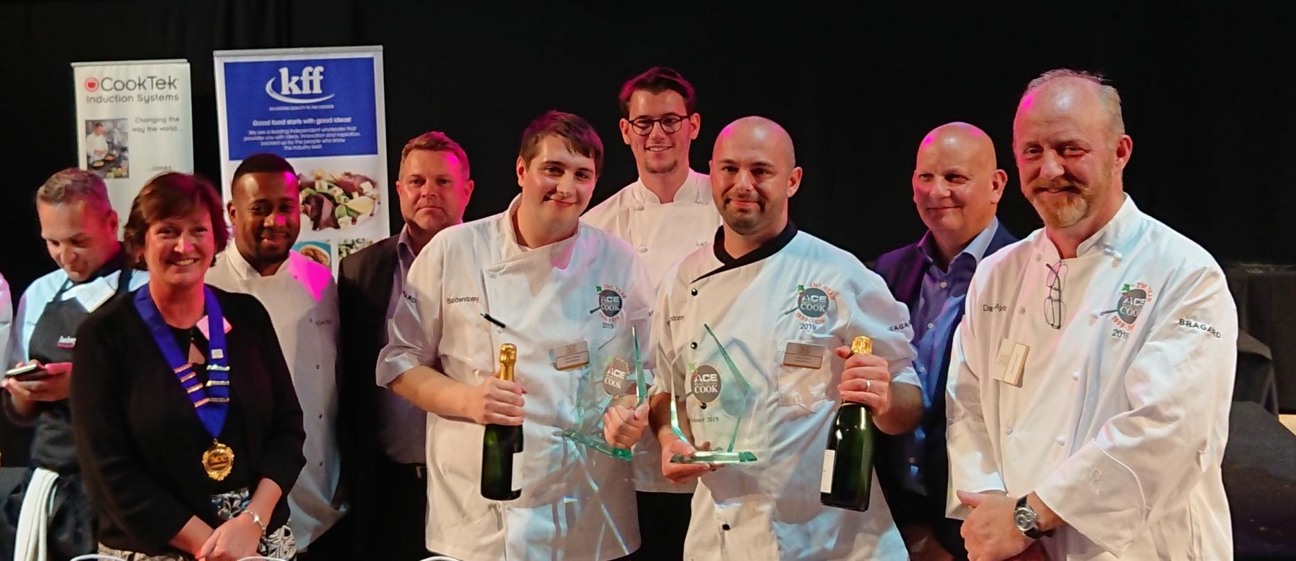 Oliver Dovey and Luke Smith from BaxterStorey with ACE chair Sue Thompson and judges BaxterStorey and Blue Apple celebrate success at ACE Ready Steady Cook
