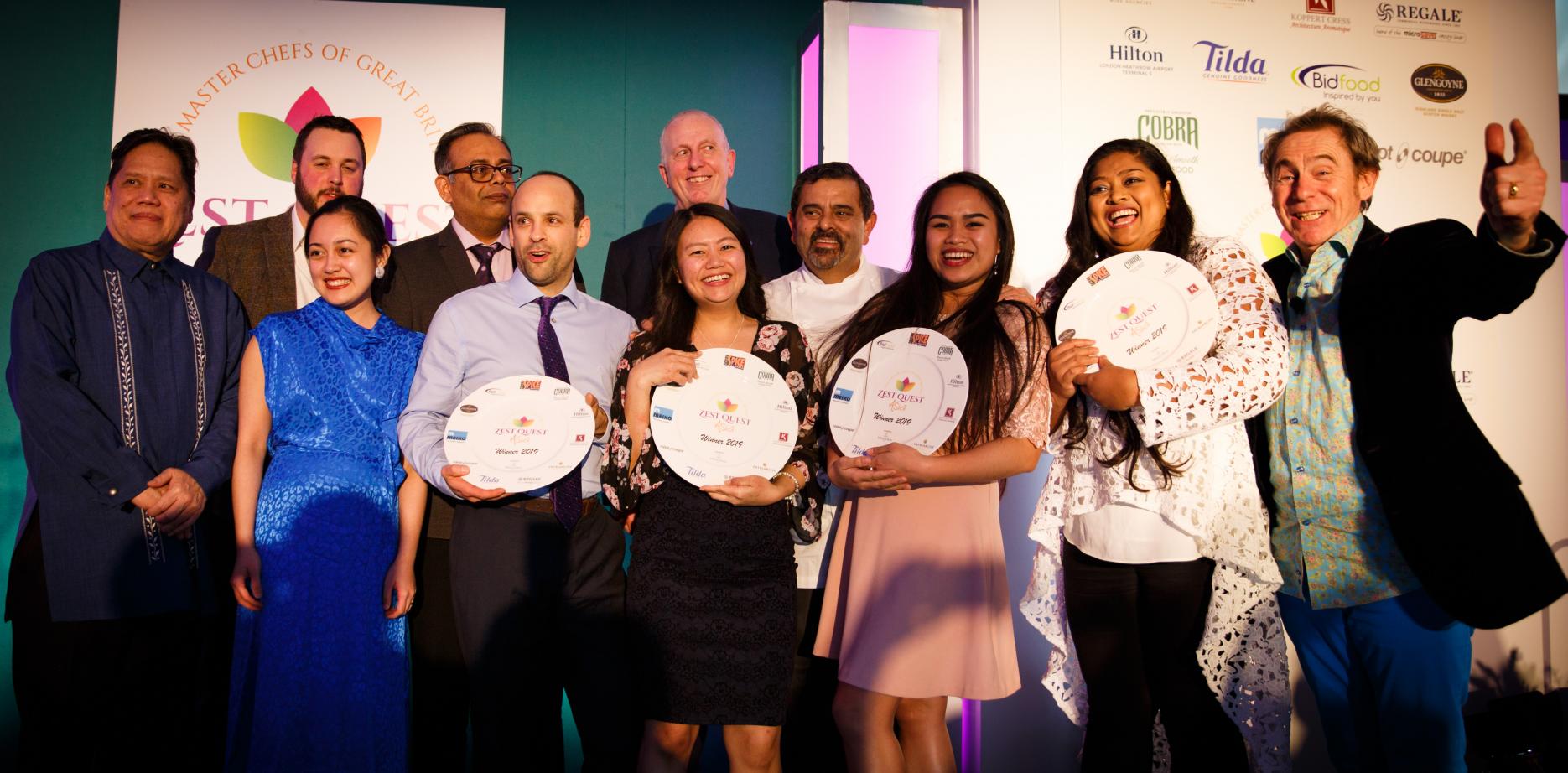 The winning UWL team with their tutor, judges and host Nigel Barden Zest Quest Asia 2019 final University of West London